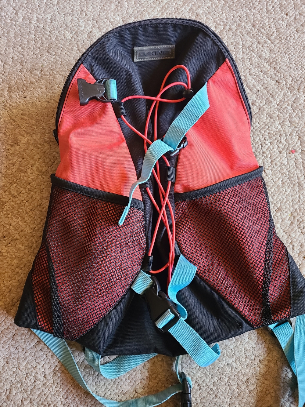 Dakine Women's Red and Black Lightweight Backpack with Blue Accents